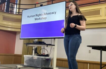 Picture of Lab member presenting during a human rights advocacy workshop.